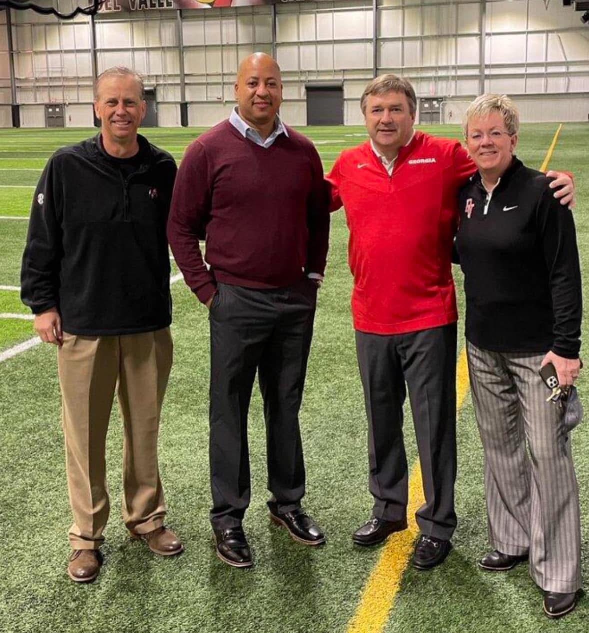 Coach Acosta with Georgia head coach Kirby Smart